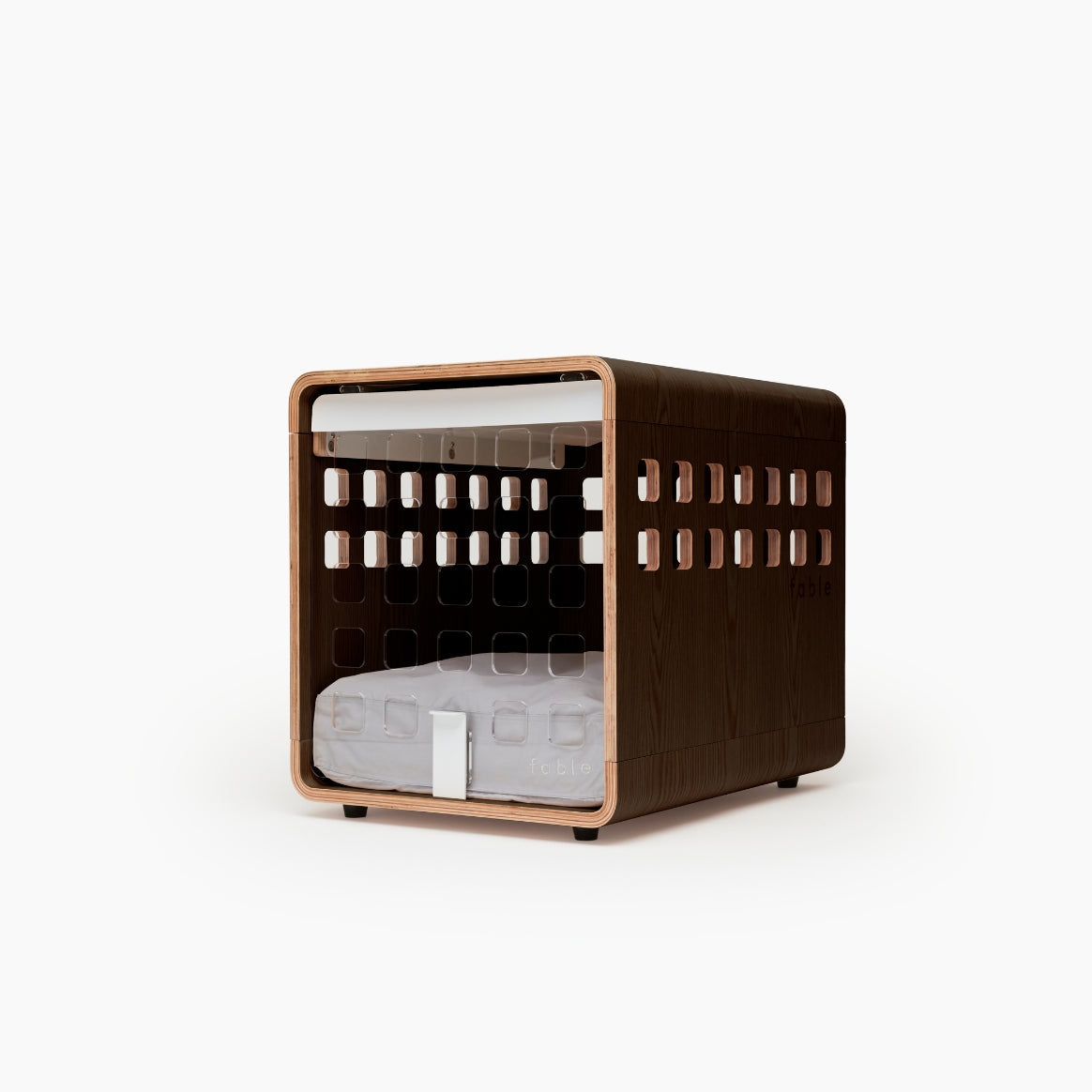 Modern dog bed with wooden frame and white cushion on a white background