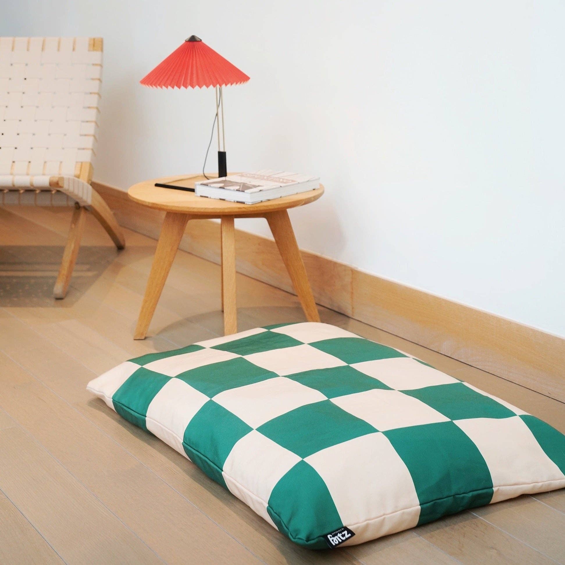 green and cream check trendy dog bed in stylish home 