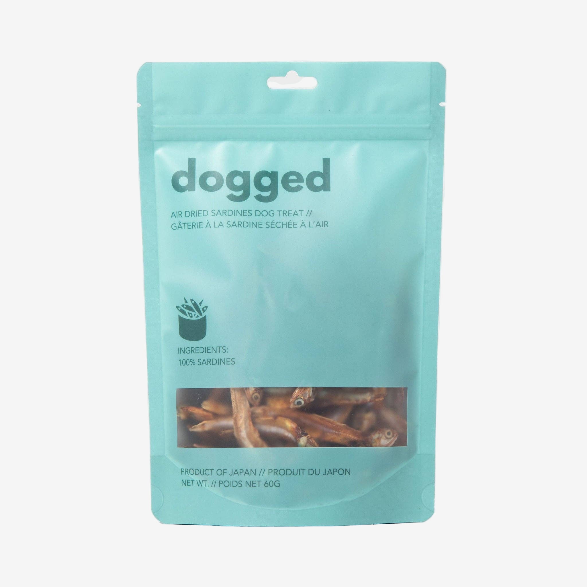 Teal package of dogged air-dried sardine dog treats on a light gray background