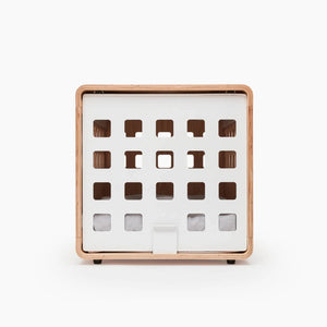 Square wooden box with cut-out compartments on a white background
