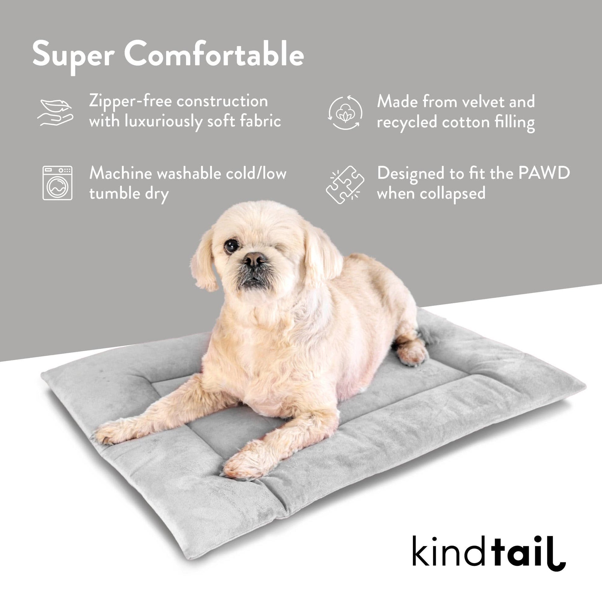 A small dog relaxes on a soft, gray, zippered pet bed made from velvet and recycled cotton, with an infographic showcasing its comfort features.