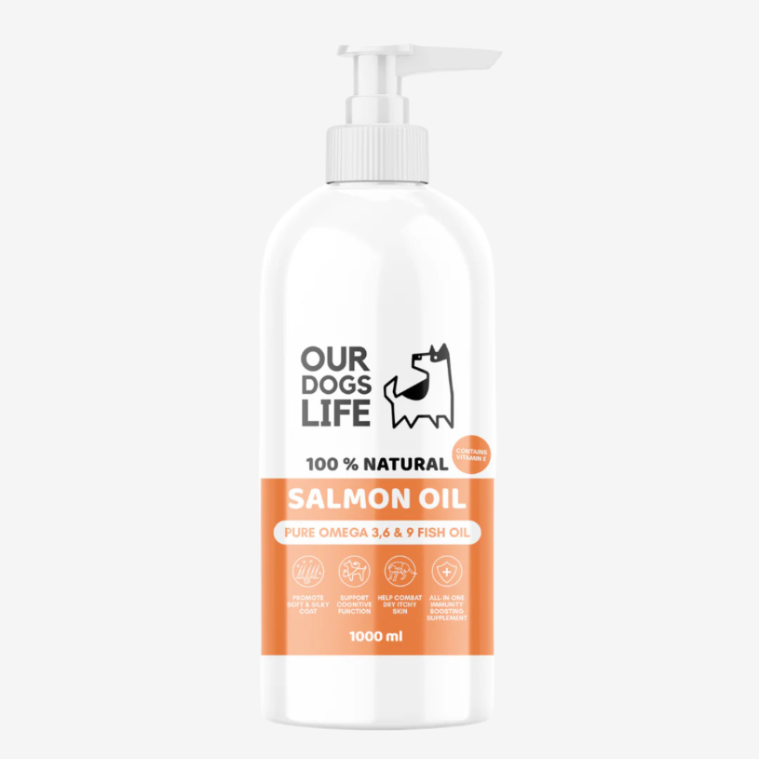 White bottle with pump and an orange label, by brand Our Dogs Life, 100% Natural Salmon oil with Pure Omega 3, 6 & 9. 