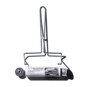 Cleaning tool for furniture with a cylindrical roller and handle on a white background