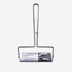 Metal cleaning tool with handle on a white background