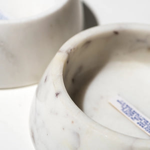 Close-up of a marble bowl with a blurred background
