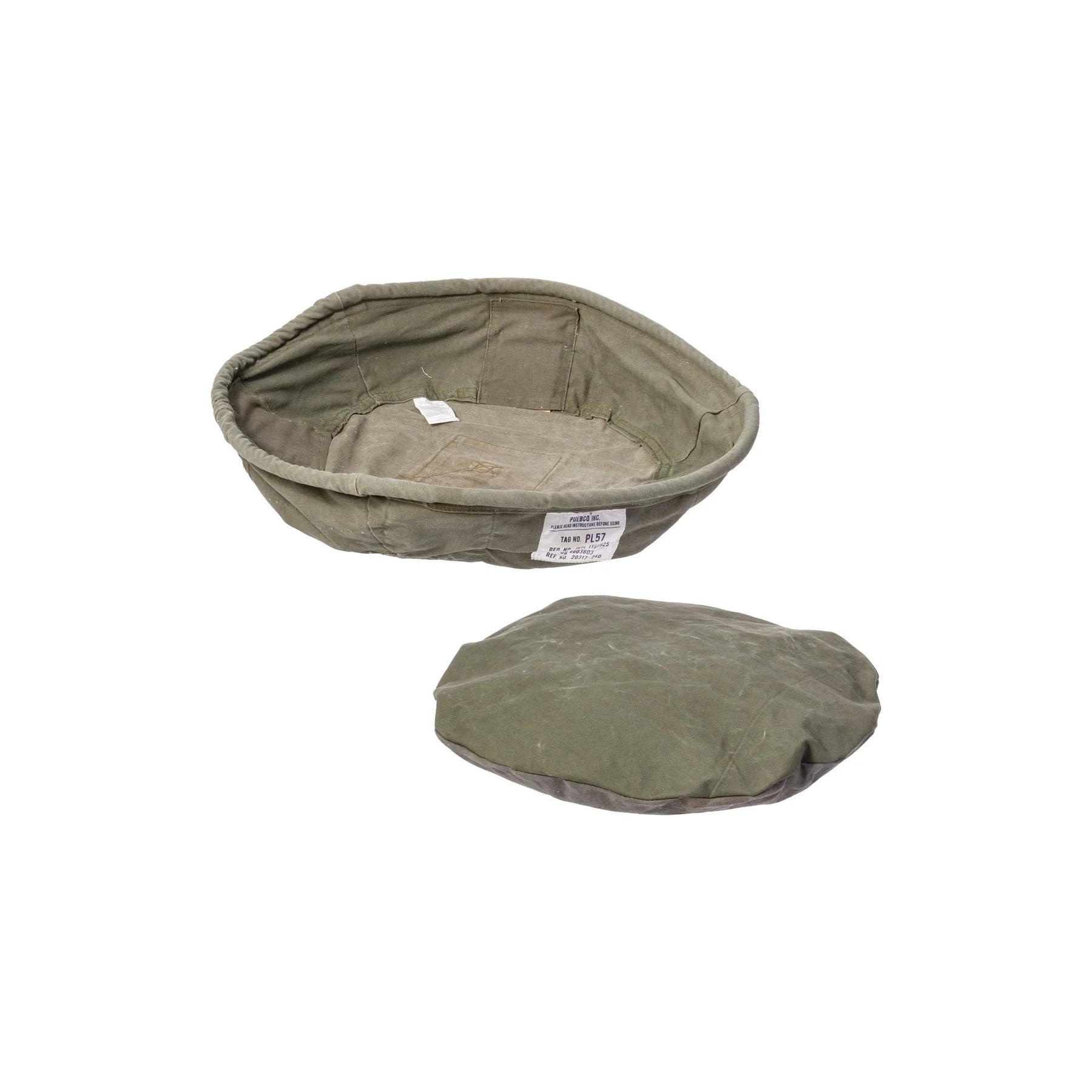 Green pet bed with cover on a white background