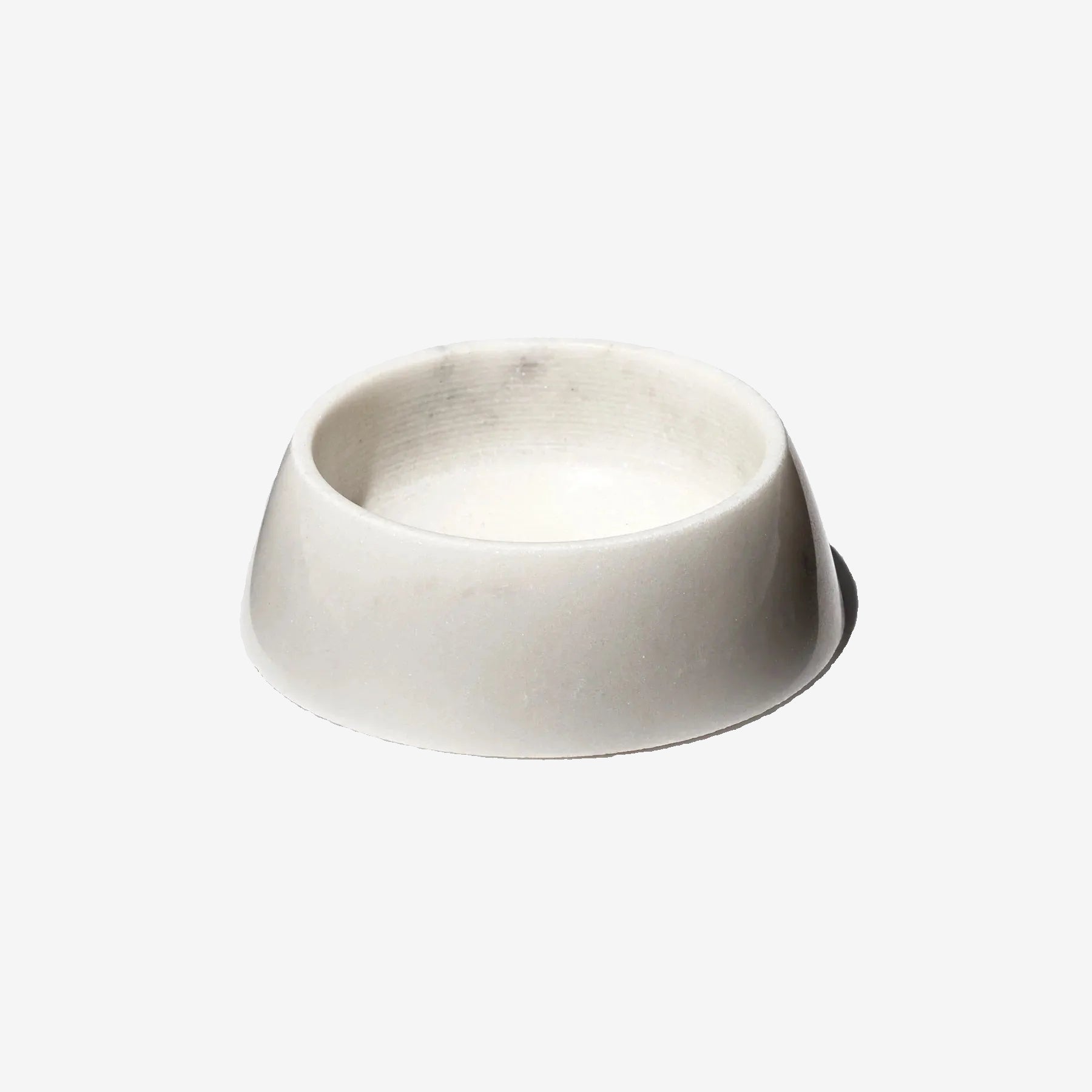 White marble bowl on a white background