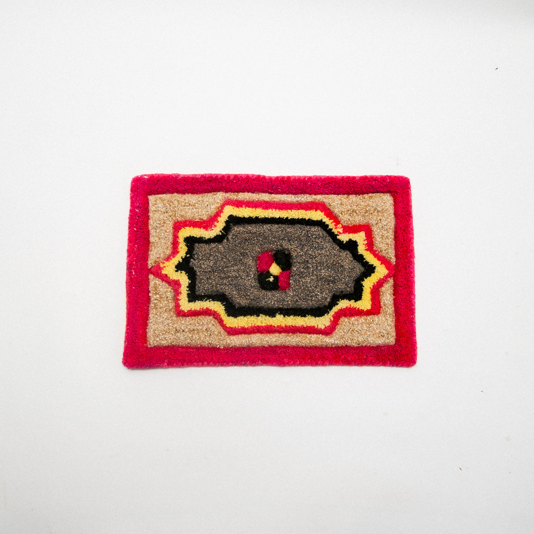 Decorative patch with geometric design on a white background