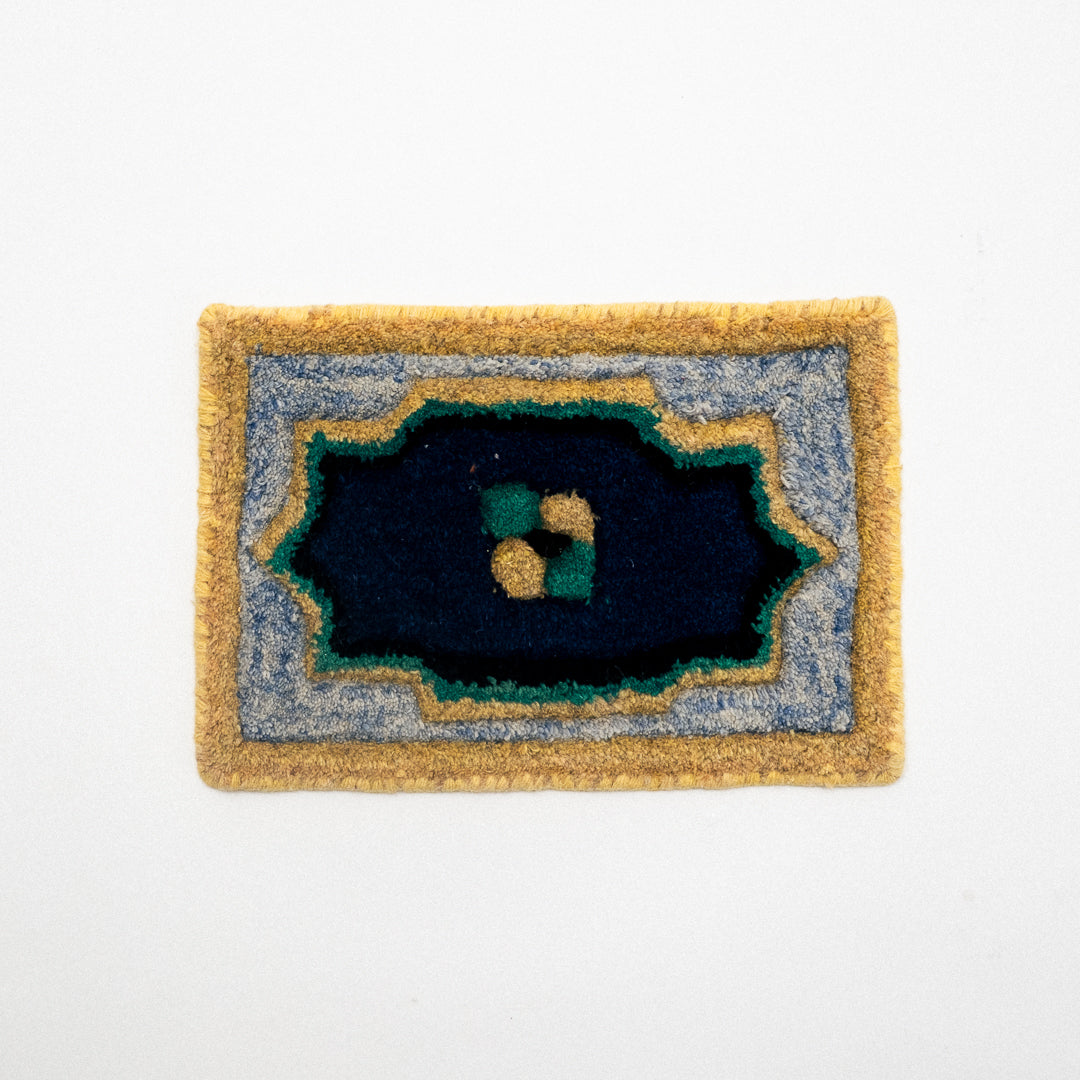 Doormat with a geometric design on a white background