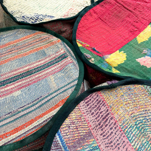 Colorful round textured objects stacked together