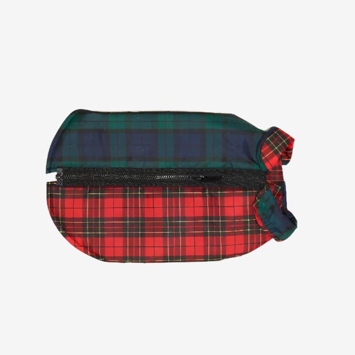 Flat lay dog coat in two colours of tartan, waterproof with a contrasting collar.